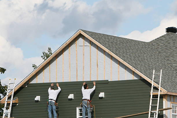 Professional Siding Installation technician working in East Earl, PA